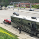 Illustration for article titled How This Big Ass RV Helped Us Sling A $240,000 Supercar Around A Dirt Track